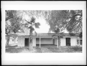 Exterior view of adobe home of Esteban Gonzales