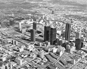 Aerial view of downtown Los Angeles, showing Bunker Hill, the civic center, and the Harbor Freeway, 1973