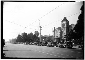 View of University Avenue, looking south towards Exposition Park, showing the library(?) of the University of Southern California, 1929