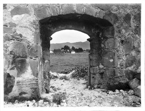 View out the main entrance to the ruins of Mission Santa Margarita, California, ca.1906