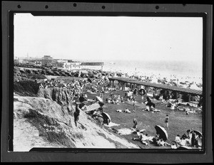 View of the beach in Santa Monica, south of the pier, ca.1920