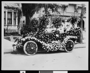 Automobile decorated with flowers for the La Fiesta Parade, ca.1906