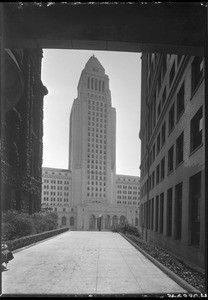 Los Angeles City Hall tower framed between other buildings, March 1931