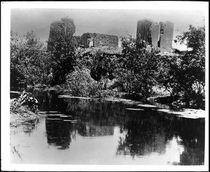 Ruins of Pio Pico's first home at Whittier Road, shown from across a pond, ca.1883