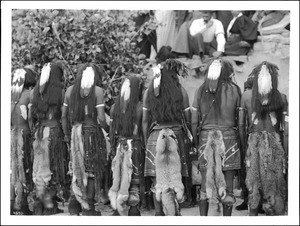 Snake priests in line before Kiva at the pueblo of Walpi, Arizona, ca.1897