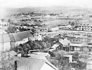 Panoramic view of the Plaza and church, showing the early landscaping of the surrounding area, Los Angeles, 1873
