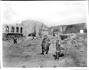 Four men among the ruins of the Mission San Juan Capistrano, 1886