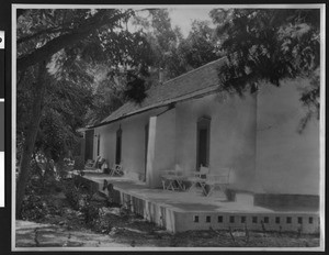 Exterior view of the front veranda of an adobe ranch house of Rancho Las Alamos of Santa Elena, Santa Barbara County, September 4, 1937