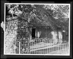 Exterior view of an old one-room cabin Mark Twain once resided in, Jackass Hill, ca.1930