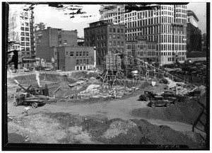 Exterior view of the Los Angeles State Building in the first stages of construction, at First Street and Broadway, on November 12, 1930