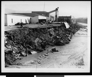 Flood damage to Warner Brothers Studio, showing the water at right, 1938