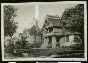 Exterior view of homes on a residential street in Pomona, ca.1900