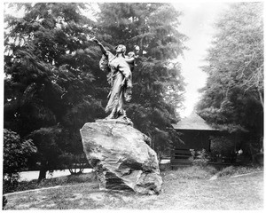 View of a statue of Sacajawea and Jean-Baptiste, by Alice Cooper, located in Washington Park, Portland, Oregon, ca.1905-1915