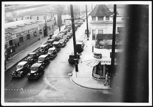 North Broadway, showing line of cars at intersection, 1920-1939