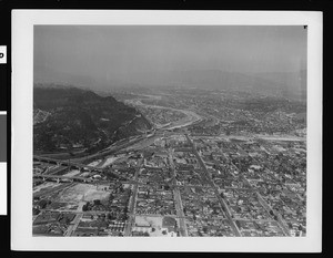 Aerial view of Los Angeles, showing the intersection of Broadway and Spring Street, 1940