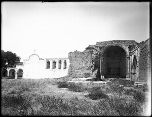 View of the front of Mission San Juan Capistrano showing the church and bell tower, as viewed from the south, 1902