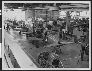 Vultee Aircraft Company's plant, showing a production line of U.S. Army Air Corps Valiant Basic Trainers (BT-13's), ca.1940-1945