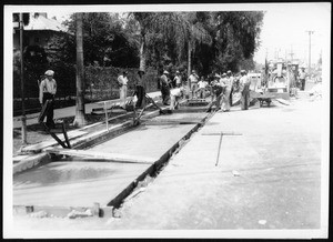 Concrete gutter construction west of Hoover Street on Adams, ca.1920-1930