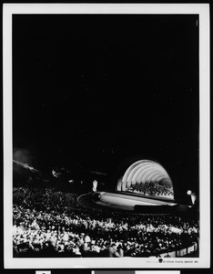 Hollywood Bowl performance at night, showing the audience