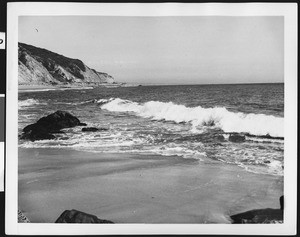 View of the Pacific shoreline showing the Roosevelt Highway in the left distance