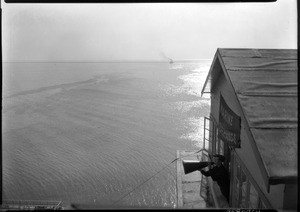 Marine Exchange Outlook hailing a passing ship, 1924