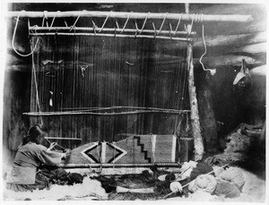 Navajo blanket maker weaving a blanket, ca.1895