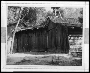 Exterior view of the empty barn of the Altaville fire department, ca.1930