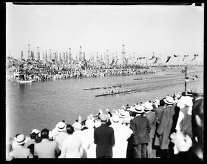 View of a crowd watching a rowing competition in Long Beach, 1932