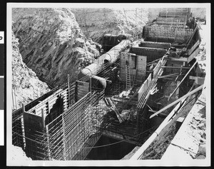 One of five Iron Mountain pumping stations, showing large pipe work and scaffolding, ca.1930