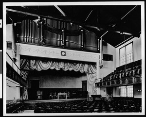 Auditorium of Van Nuys High School, showing the pipe organ above the stage, ca.1915