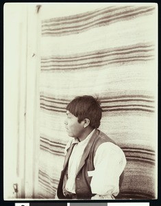 Portrait of a Walpai Indian man in front of a blanket, Kingman, Arizona