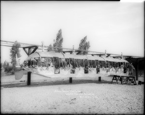 "Fawkes' Folly", an experimental monorail car built by J.W. Fawkes in Burbank and adorned with flags and decorations, 1907-1910(?)