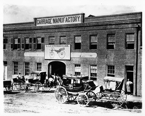 Exterior view of L. Lichtenberger's carriage factory, Los Angeles, 1880