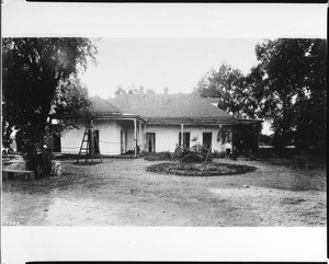 Exterior view of the Purcell Adobe as seen from the rear at Main Street and Car Street, San Gabriel, 1889