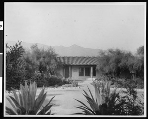 Exterior view of the Arallanes (Arrelanes?) house, the oldest adobe in Santa Barbara, later used as a Community Welfare Center, ca.1936