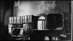 Interior view of East Side Railroad Station, showing what appears to be the inside of a ticket window, December 1, 1917