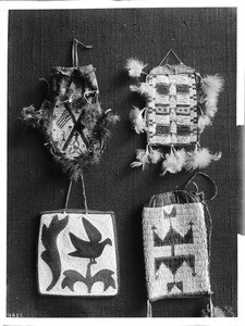 Collection of 4 pieces of Sioux Indian bead work on display, ca.1900