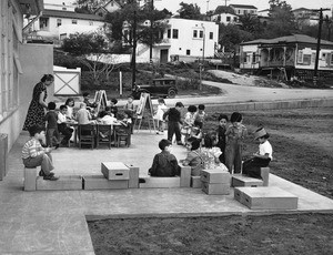 Kindergartners working on projects in front of a school on City Terrace Drive north of Boyle Heights