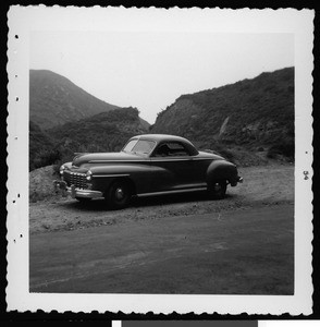 Santa Ana Range, showing an automobile, ca.1945