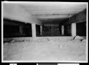 View under the floor joists of a Department of Public Works structure
