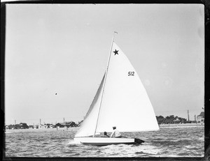 Two people in a sailboat in Long Beach