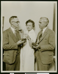 California Botanic Gardens, showing seedlings held by Dr. Merrill and others