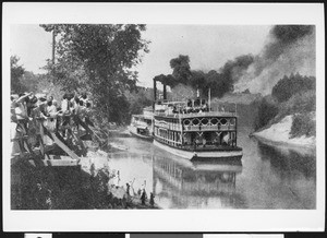 Paddle wheel showboat on the Mississippi river, ca.1850-1860