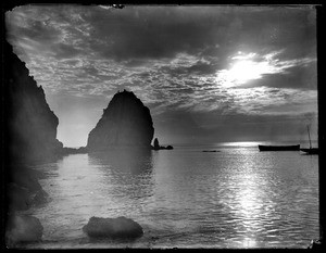 Moonlight over the water and Sugarloaf rock at Santa Catalina Island, ca.1900