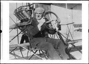 Stunt pilot Lincoln Beachey at the controls of a Curtis biplane at the Dominguez Hills Air Meet, 1912