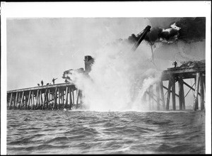 Blast from an underwater charge during the construction of the San Pedro Breakwater, Los Angeles, ca.1900