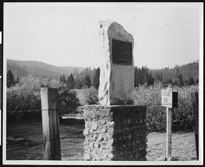 Monument and bronze tablet marking the pioneer emigrant trail of 1849, Truckee, ca.1930