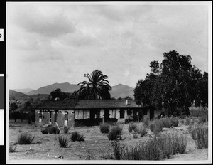 Exterior view of the Rancho Monserratte, shown from a distance, Fallbrook, 1870-1880