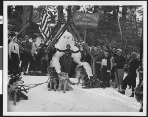 Group portrait of the Los Angeles Junior Chamber of Commerce standing in the snow in the mountains, ca.1930