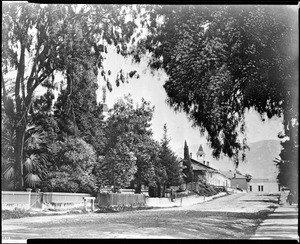 Distant view of Mission San Luis Obispo de Tolosa, looking at the south wing of the mission, ca.1895